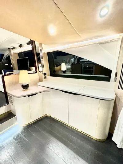 Kara Mia II Yacht Photos Pics Interior of 2019 Azimut 55 Motor Yacht with modern furnishings and ambient lighting.