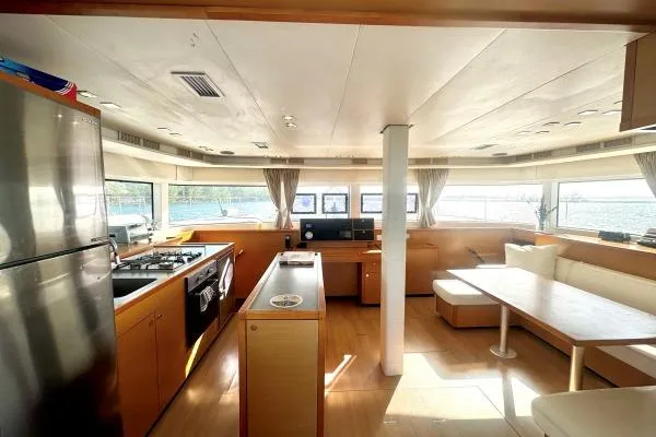 Nauti Adventure Yacht Photos Pics Interior of 2015 Lagoon 52 F yacht with modern kitchen and dining area.