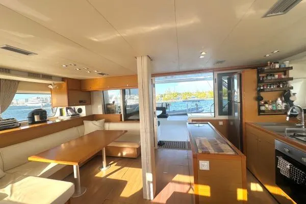 Nauti Adventure Yacht Photos Pics Interior of 2015 Lagoon 52 F yacht with modern kitchen and dining area.