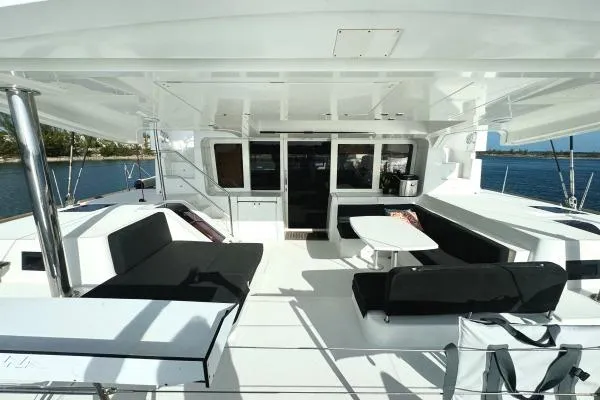 Nauti Adventure Yacht Photos Pics Spacious deck of 2015 Lagoon 52 F yacht with seating and table.