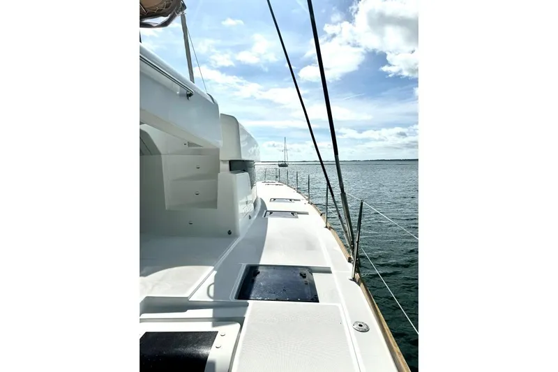 Nauti Adventure Yacht Photos Pics 2015 Lagoon 52 F yacht deck with ocean view under a bright sky.