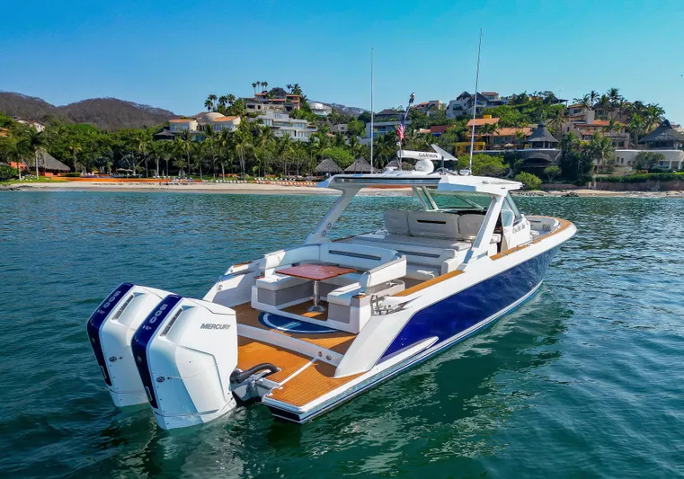 Oso Del Mar Yacht Photos Pics 2022 Tiara Yachts 43 LS in scenic coastal waters, showcasing luxury and design.