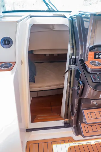 Oso Del Mar Yacht Photos Pics 2022 Tiara Yachts 43 LS cabin entrance with luxurious interior and modern controls.