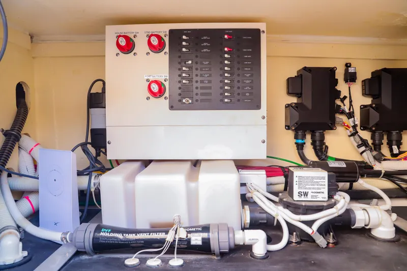 Oso Del Mar Yacht Photos Pics Electrical panel and components inside a 2022 Tiara Yachts 43 LS boat.