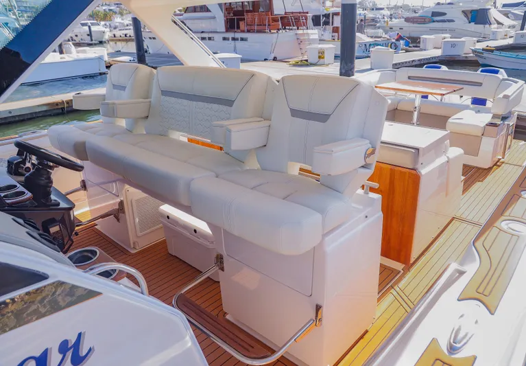 Oso Del Mar Yacht Photos Pics Luxurious seating on 2022 Tiara Yachts 43 LS, featuring elegant design and premium materials.