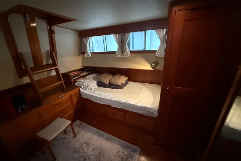  Yacht Photos Pics Cozy cabin interior of 1981 Grand Banks 42 Classic yacht with wooden furnishings.