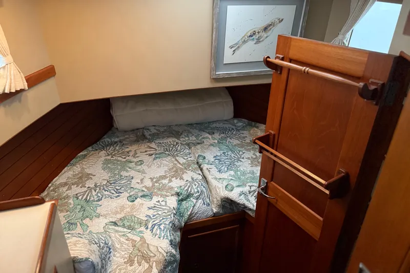  Yacht Photos Pics Cozy cabin interior of 1981 Grand Banks 42 Classic with nautical decor.