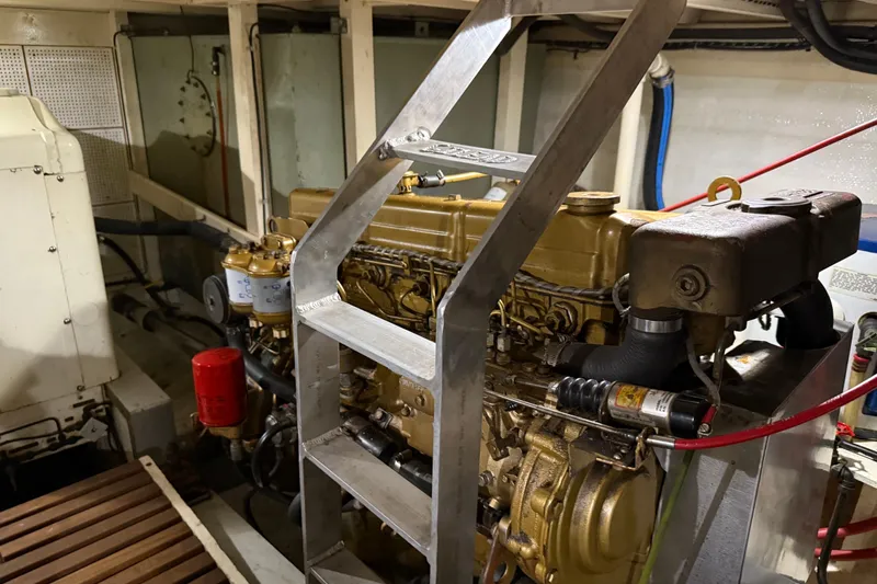  Yacht Photos Pics Engine room of 1981 Grand Banks 42 Classic yacht, featuring a detailed view of the engine.