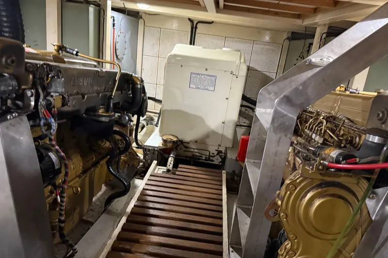  Yacht Photos Pics Engine room of a 1981 Grand Banks 42 Classic yacht, showcasing machinery and equipment.