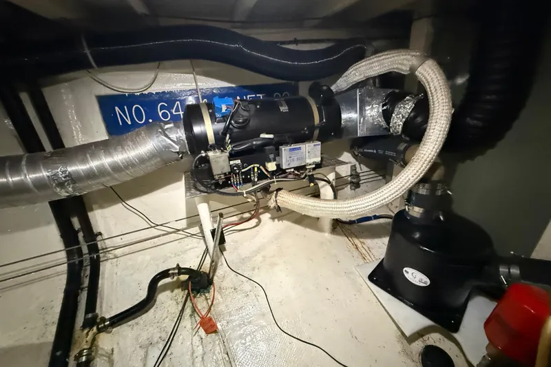  Yacht Photos Pics Engine room of 1981 Grand Banks 42 Classic with mechanical components and wiring.