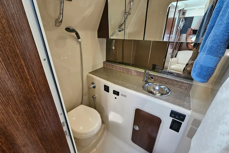 Moxie Spirt Yacht Photos Pics 2012 Cruisers Yachts 350 Express bathroom with shower, sink, and toilet.