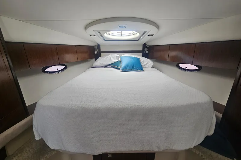 Moxie Spirt Yacht Photos Pics Luxurious cabin interior of 2012 Cruisers Yachts 350 Express with cozy bedding.