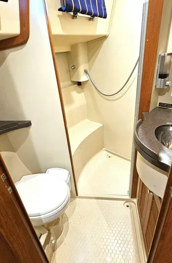  Yacht Photos Pics 2009 Island Packet 465 yacht bathroom with shower, toilet, and sink.