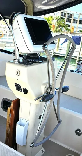  Yacht Photos Pics Steering console of 2009 Island Packet 465 yacht with navigation equipment.