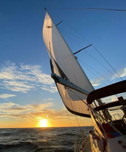  Yacht Photos Pics Sailing at sunset on a 2009 Island Packet 465 yacht.