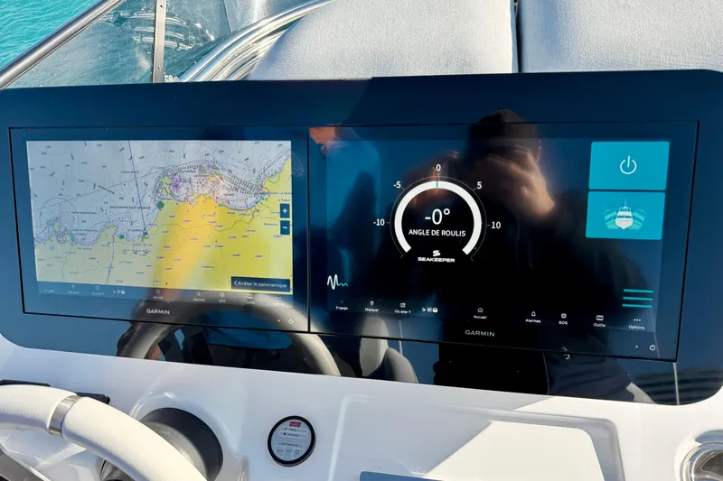  Yacht Photos Pics Dashboard of 2024 Azimut Fly 53 yacht with navigation and control screens.