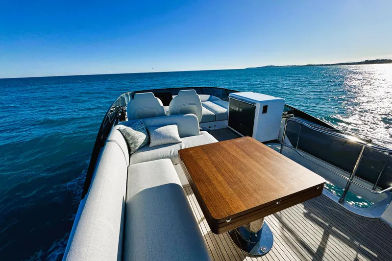 Yacht Photos Pics Luxurious Azimut Fly 53 yacht deck with elegant seating, ocean view, 2024 model.