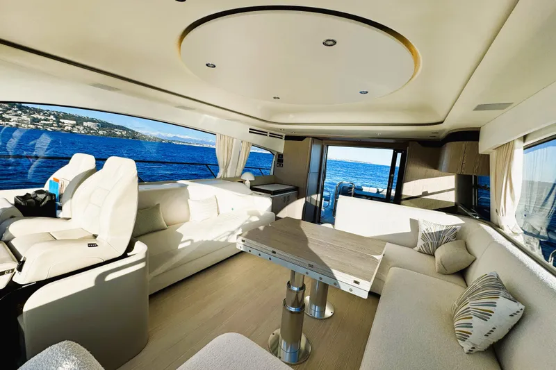  Yacht Photos Pics Luxurious interior of 2024 Azimut Fly 53 yacht with elegant seating and ocean view.