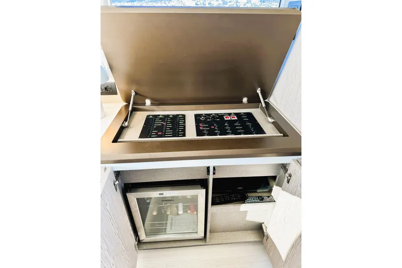  Yacht Photos Pics 2024 Azimut Fly 53 yacht interior control panel and mini fridge.
