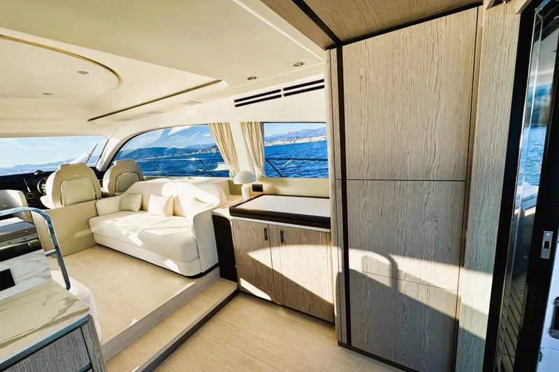  Yacht Photos Pics Luxurious interior of 2024 Azimut Fly 53 yacht with elegant seating and ocean view.