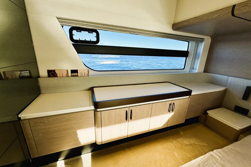  Yacht Photos Pics Luxurious interior of 2024 Azimut Fly 53 yacht with ocean view window.