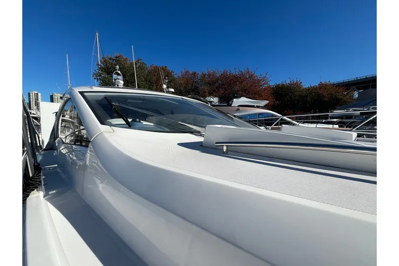  Yacht Photos Pics 2024 Sessa Marine C38 yacht docked under clear blue sky.