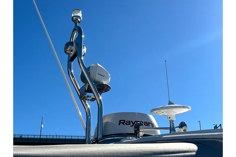  Yacht Photos Pics Radar and antenna equipment on 2024 Sessa Marine C38 yacht under clear blue sky.