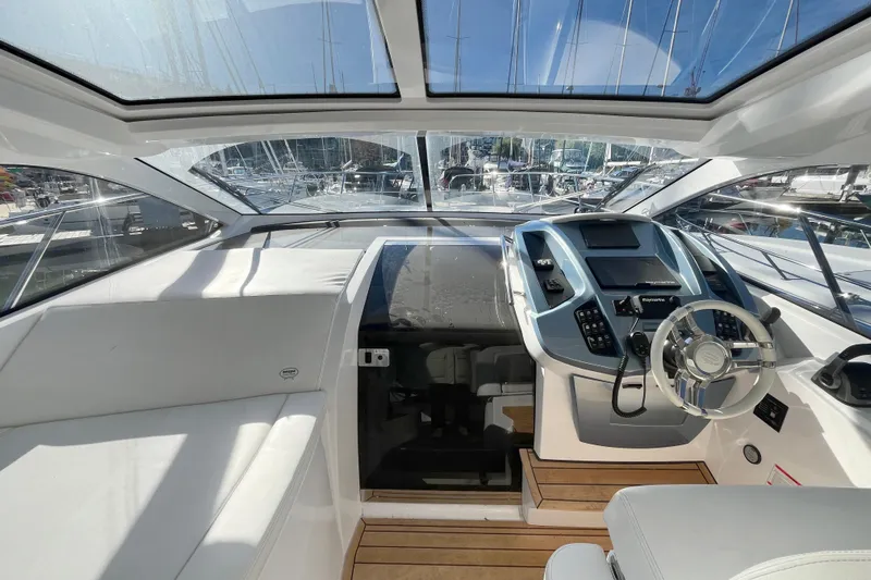  Yacht Photos Pics 2024 Sessa Marine C38 yacht cockpit with modern controls and panoramic windows.