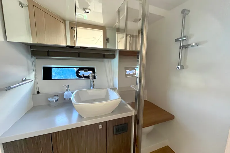  Yacht Photos Pics Modern bathroom in 2024 Sessa Marine C38 yacht with sleek sink and shower.