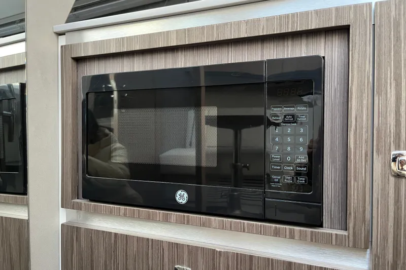  Yacht Photos Pics Built-in GE microwave in 2024 Sessa Marine C38 yacht kitchen.