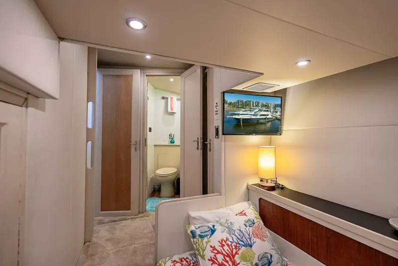 Miss Pearl Yacht Photos Pics Interior of 1989 Hatteras 65 Enclosed Bridge yacht with cozy cabin and modern amenities.