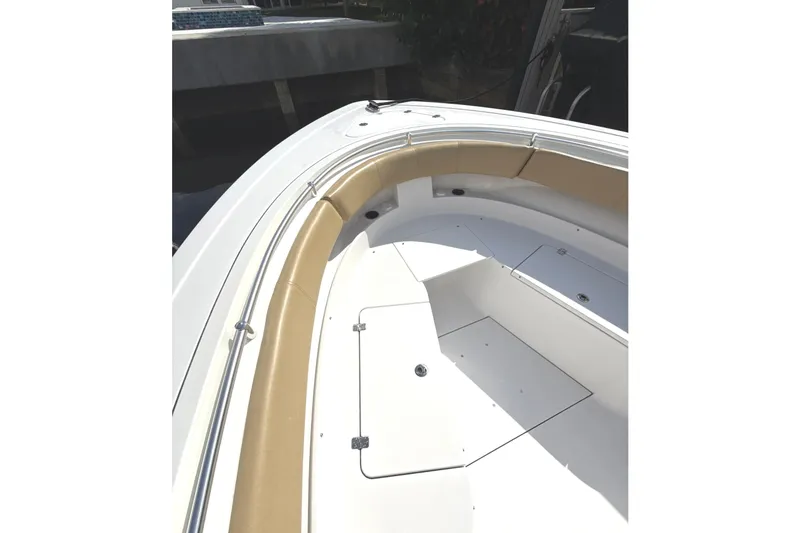 Scungilli Yacht Photos Pics 2023 Sportsman Open 352 Center Console boat interior with tan seating and white deck.