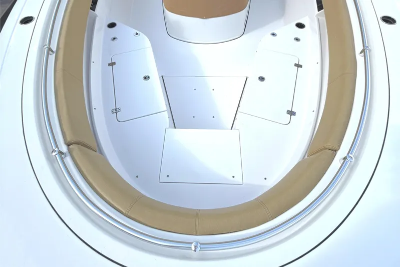 Scungilli Yacht Photos Pics 2023 Sportsman Open 352 Center Console boat with tan seating and storage compartments.