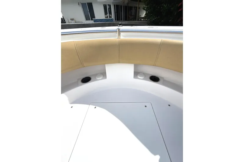 Scungilli Yacht Photos Pics 2023 Sportsman Open 352 Center Console boat interior with cushioned seating and storage.