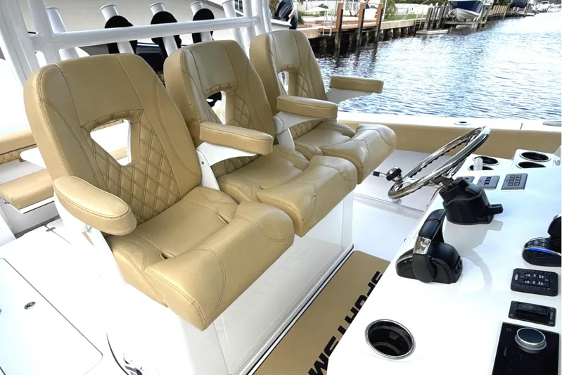 Scungilli Yacht Photos Pics 2023 Sportsman Open 352 Center Console with tan leather seats and modern helm controls.