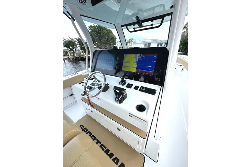 Scungilli Yacht Photos Pics 2023 Sportsman Open 352 Center Console boat dashboard with advanced navigation system.