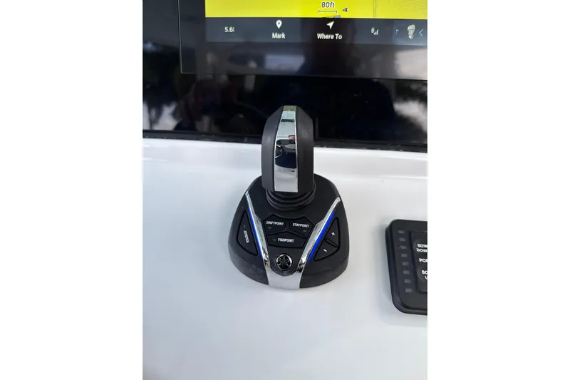 Scungilli Yacht Photos Pics Control panel of 2023 Sportsman Open 352 Center Console boat, featuring joystick and display.