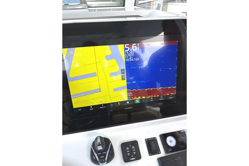 Scungilli Yacht Photos Pics 2023 Sportsman Open 352 Center Console with Garmin navigation display and controls.