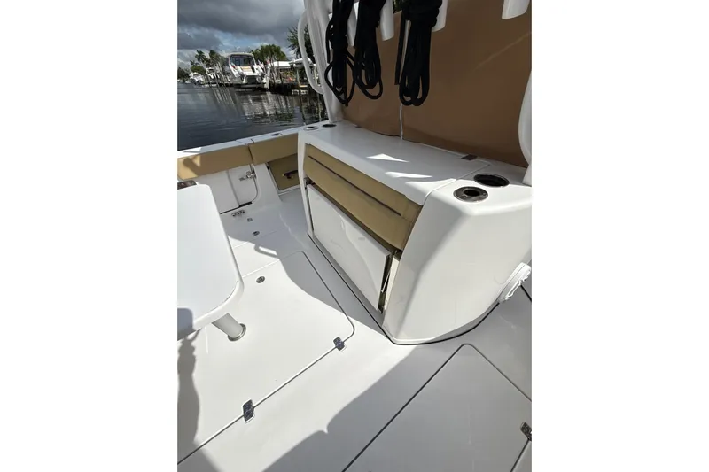 Scungilli Yacht Photos Pics 2023 Sportsman Open 352 Center Console boat interior with seating and cup holders.