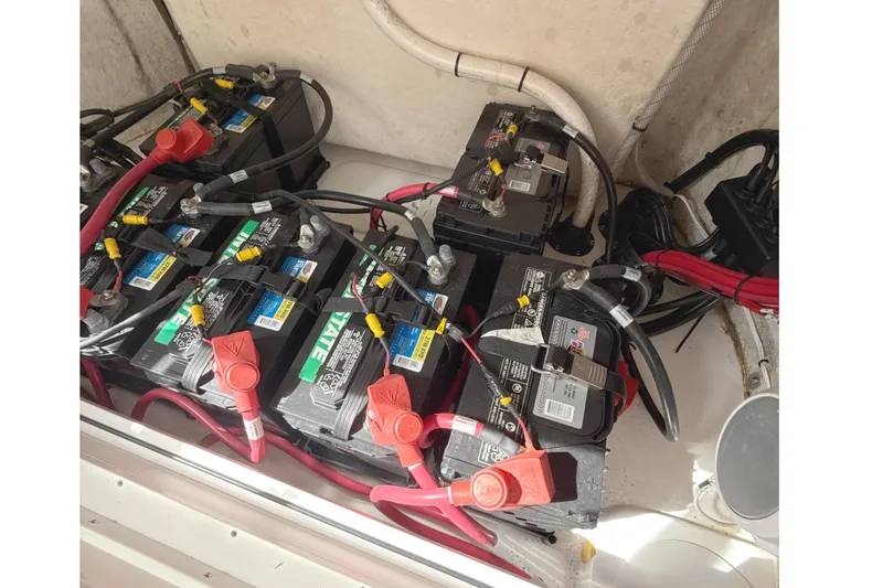 Scungilli Yacht Photos Pics Battery compartment of 2023 Sportsman Open 352 Center Console with multiple connected batteries.