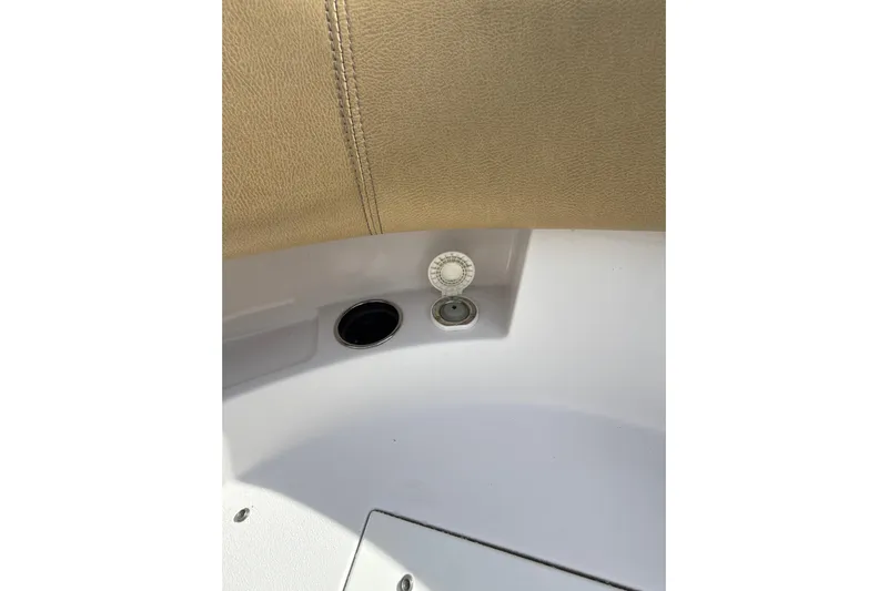 Scungilli Yacht Photos Pics 2023 Sportsman Open 352 Center Console interior detail with beige upholstery and control panel.