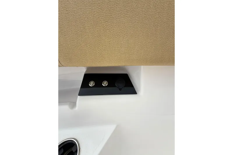 Scungilli Yacht Photos Pics 2023 Sportsman Open 352 Center Console interior detail with beige upholstery and control panel.