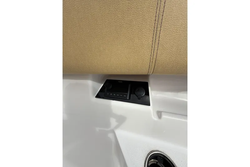 Scungilli Yacht Photos Pics 2023 Sportsman Open 352 Center Console interior detail with control panel and beige upholstery.