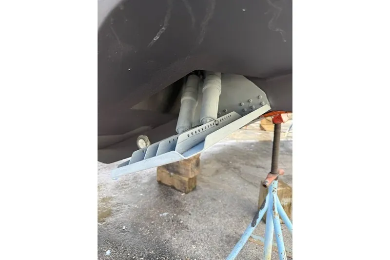 Scungilli Yacht Photos Pics 2023 Sportsman Open 352 Center Console boat hull detail on support stands.