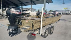 2017 Tracker 2072 boat with Mercury outboard motor on a trailer.