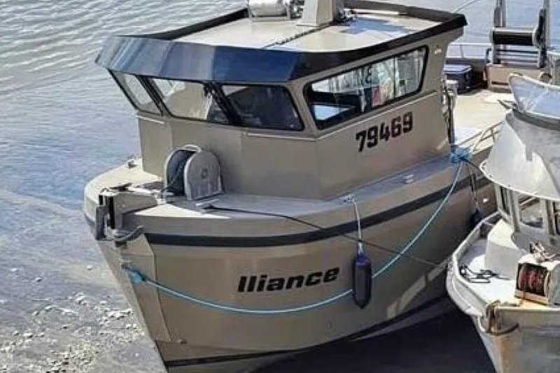 Alliance Yacht Photos Pics Custom Freestyle Marine 32 boat, 2022 model, docked with visible registration number.