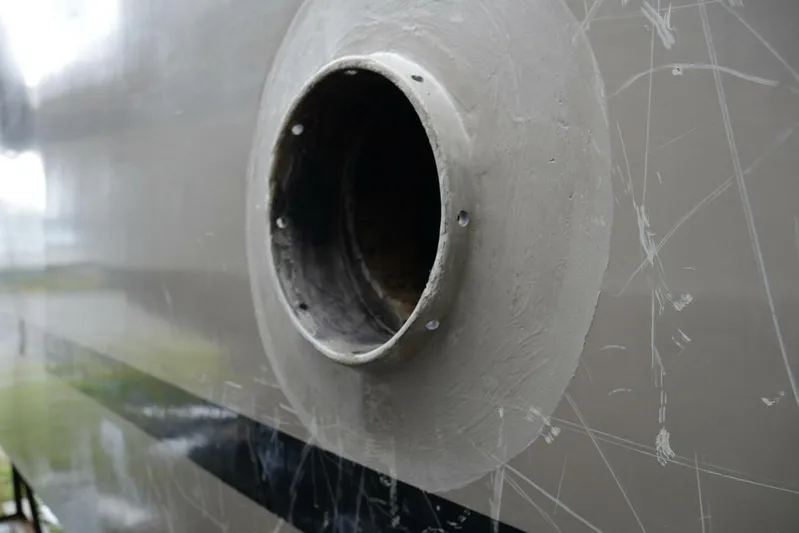 Alliance Yacht Photos Pics Close-up of a 2022 Custom Freestyle Marine 32 boat hull with a circular opening.