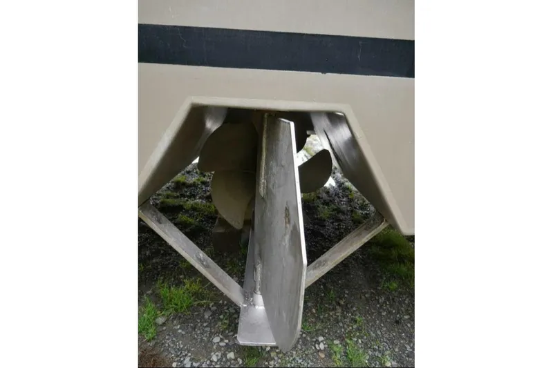 Alliance Yacht Photos Pics Close-up of 2022 Custom Freestyle Marine 32 boat propeller and rudder.