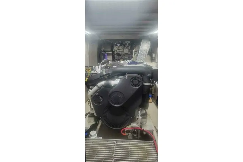 Alliance Yacht Photos Pics Engine room of 2022 Custom Freestyle Marine 32 boat, showcasing mechanical components.