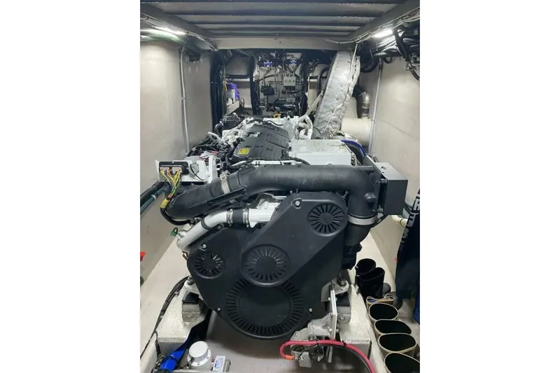 Alliance Yacht Photos Pics Engine room of 2022 Custom Freestyle Marine 32 boat, showcasing detailed machinery.